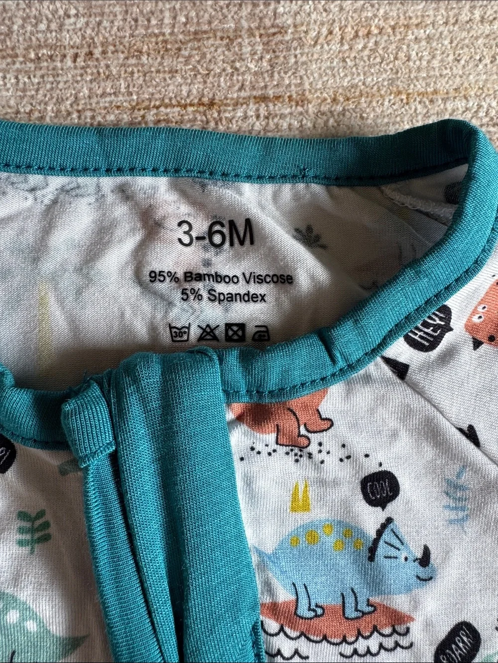 Little Peanut Baby One-Piece Zip Up Pajamas with Teal Trim and Dinosaur Print